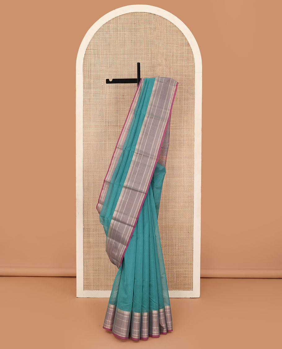 Blue plain silk cotton saree, contrast striped border, and plain pallu