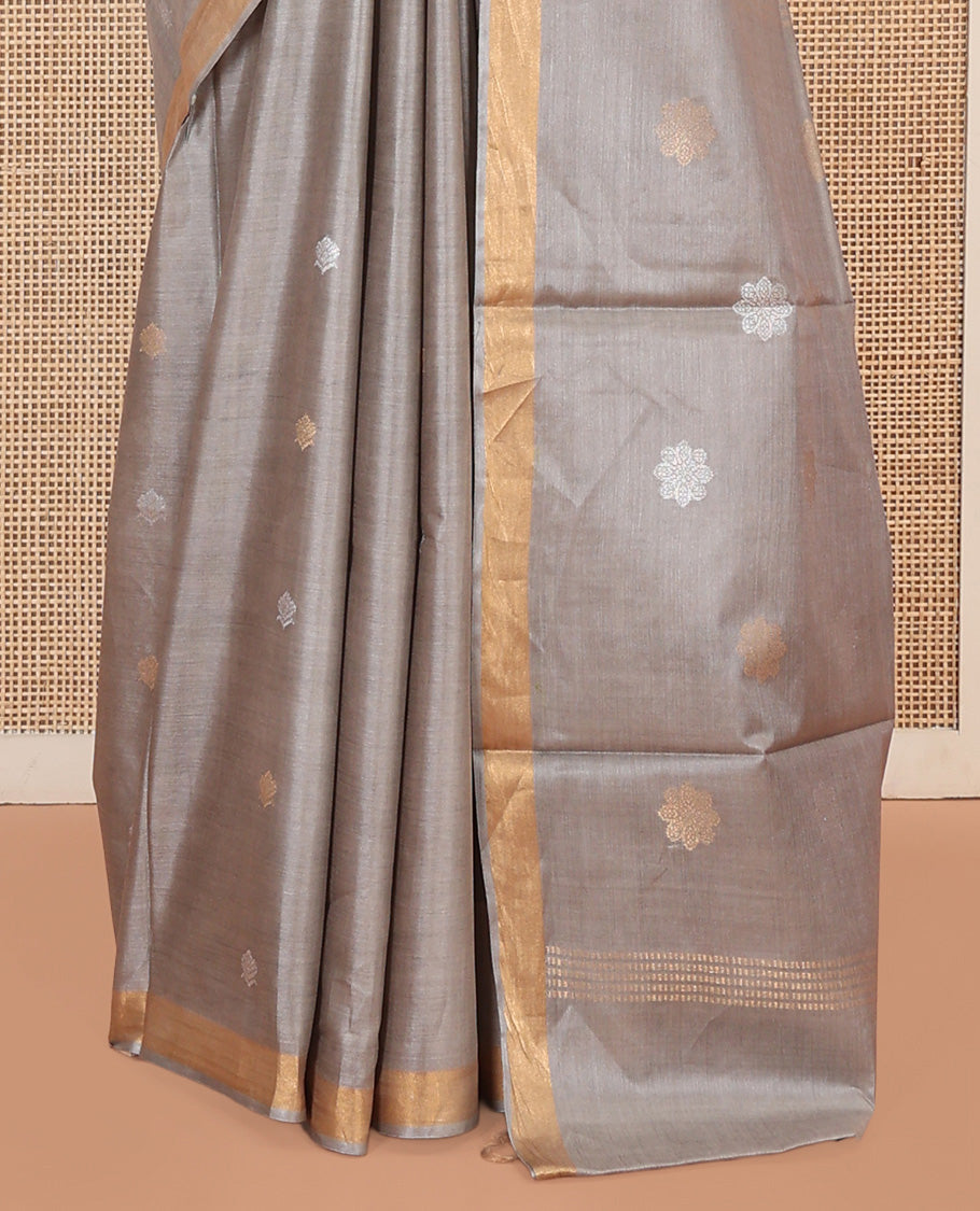 Grey Tussar Saree Subtly Sparkled with Buttas, a Subtle Zari Border, Pallu of Zari Designs, and a Matching Blouse