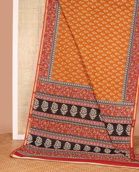 Orange unique motifs printed mul mul cotton saree, contrast floral vine printed border, and pallu of floral print