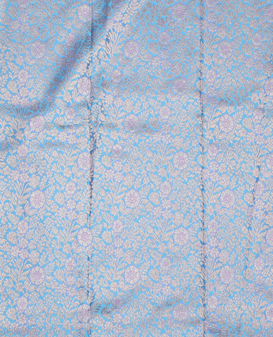 Green pure-silk half-saree, jacquard skirt, contrast blouse, and border of Mughal-style zari designs, and intricate dhavani