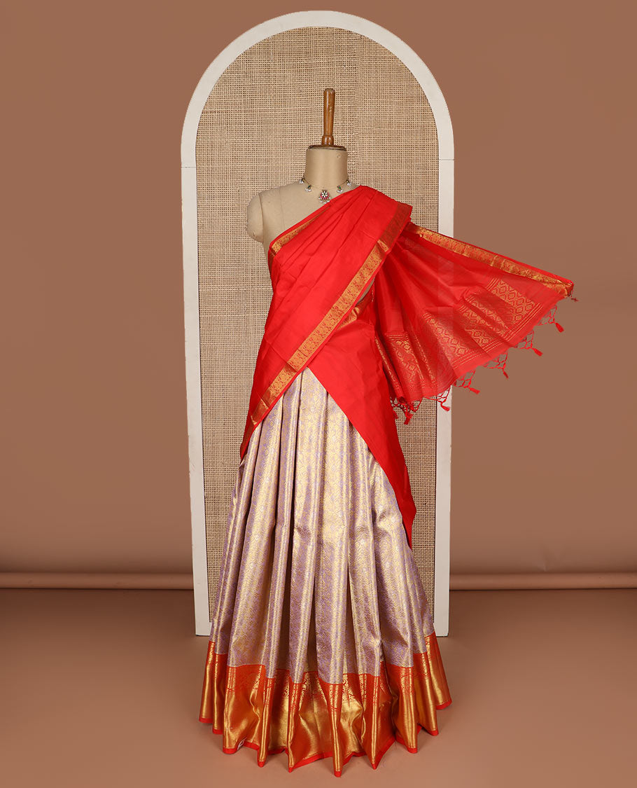 Grey pure silk half saree, floral vine jacquard, contarst jacquard blouse and border of thilakam, muthu, neli and kodi visiry, and jaal design dhavani