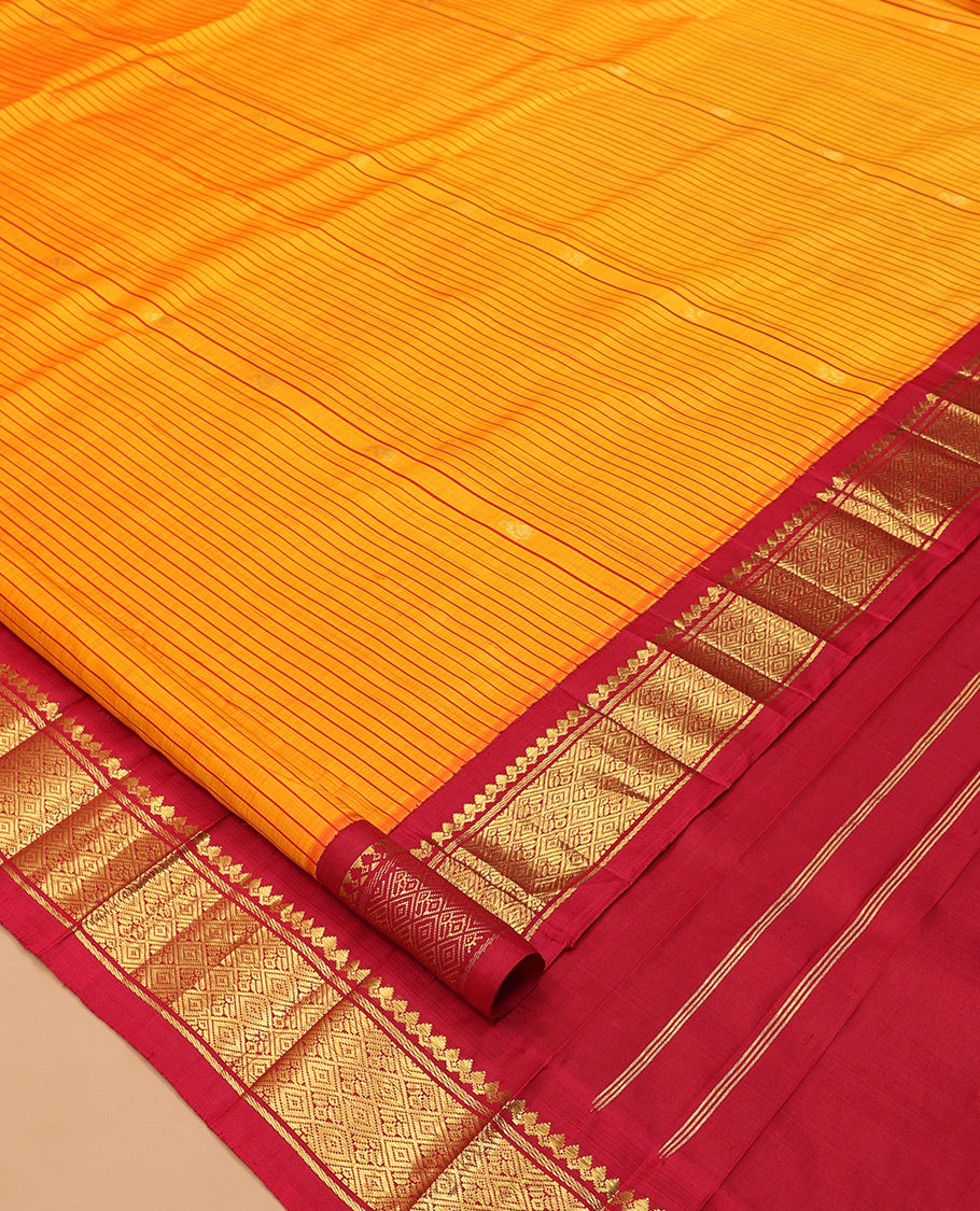 Orange Striped Kanchipuram Silk Saree, Woven with Zari Buttas, Complemented by a Contrast Korvai Border of Thilakam Mokku, Banaras, Muthu, and Jaal Design, Zari Design Pallu, and No Blouse