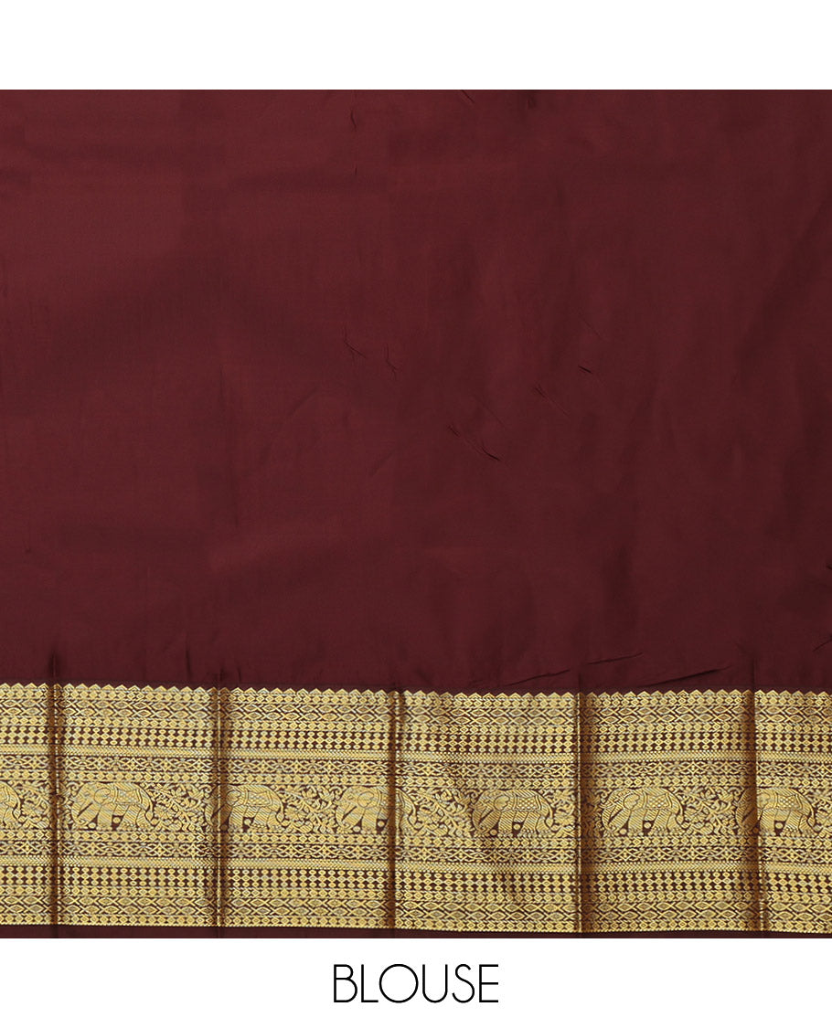 Orange Budget Silk Saree Features Kolam Buttas, Complemented by a Contrast Traditional Zari Border, Grand Pallu, and a Contrast Blouse