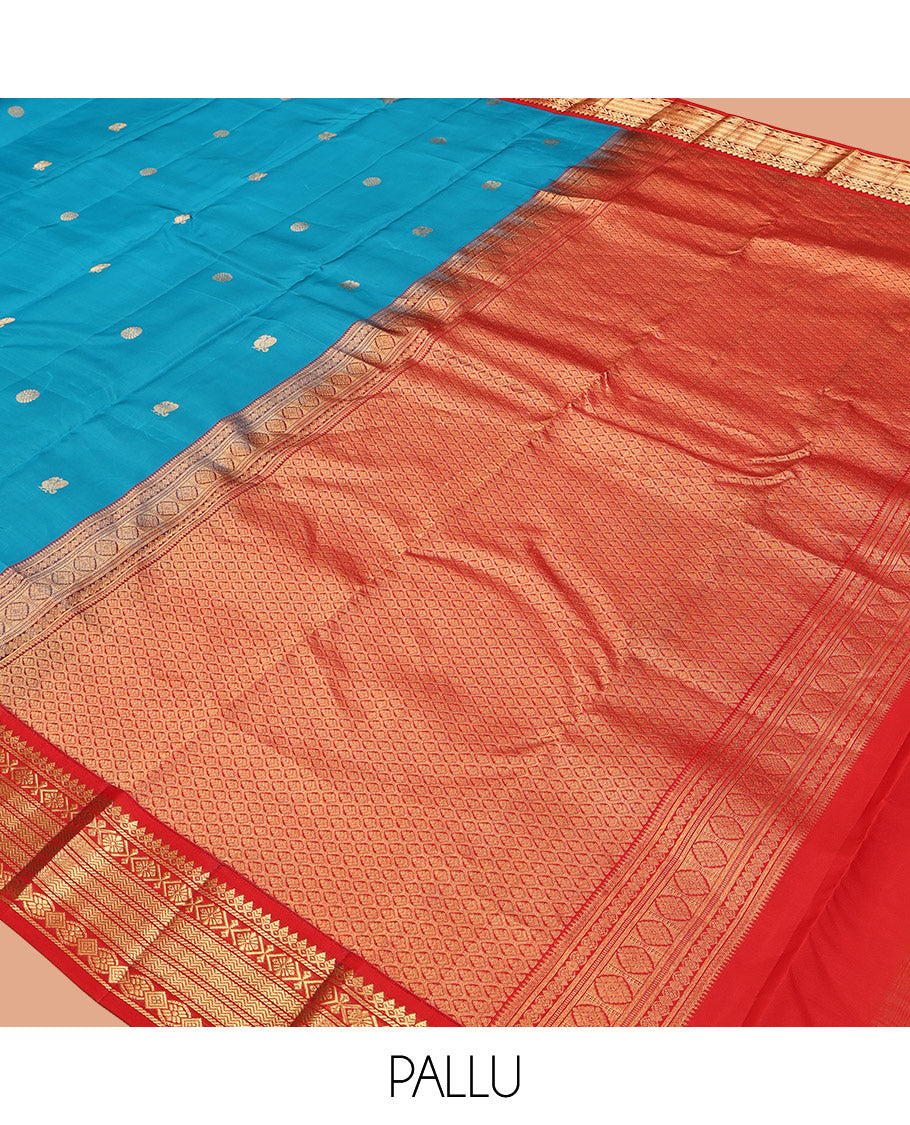 Blue Vasundhara Lite-Silk Mix Saree, Decked Up with Mayil-Chakram Buttas, Contrast Border of Thilakam Mokku, Banaras, and Vanki Design, Jaal Pallu, and a Contrast Blouse