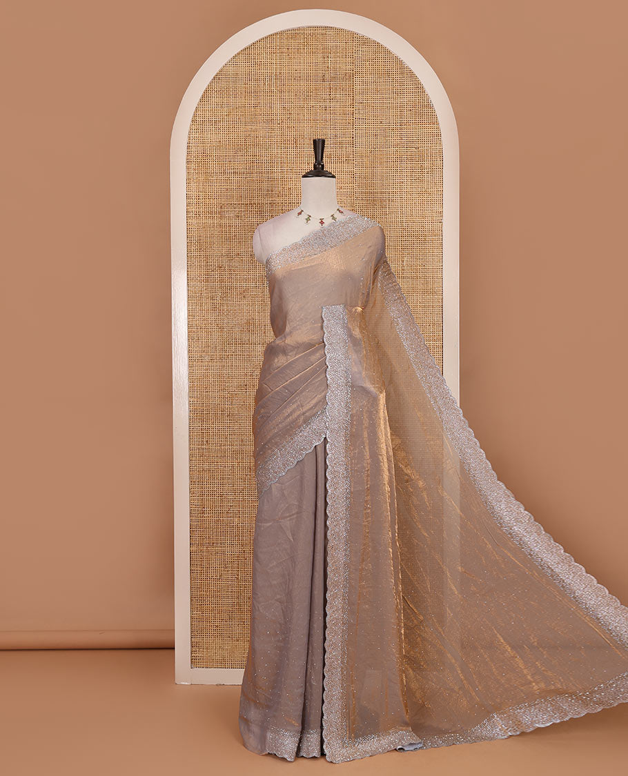 Grey Swarovski crystal stone embedded fendy chiffon saree, scallop Swarovski stone embroidered border, and contrast plain blouse