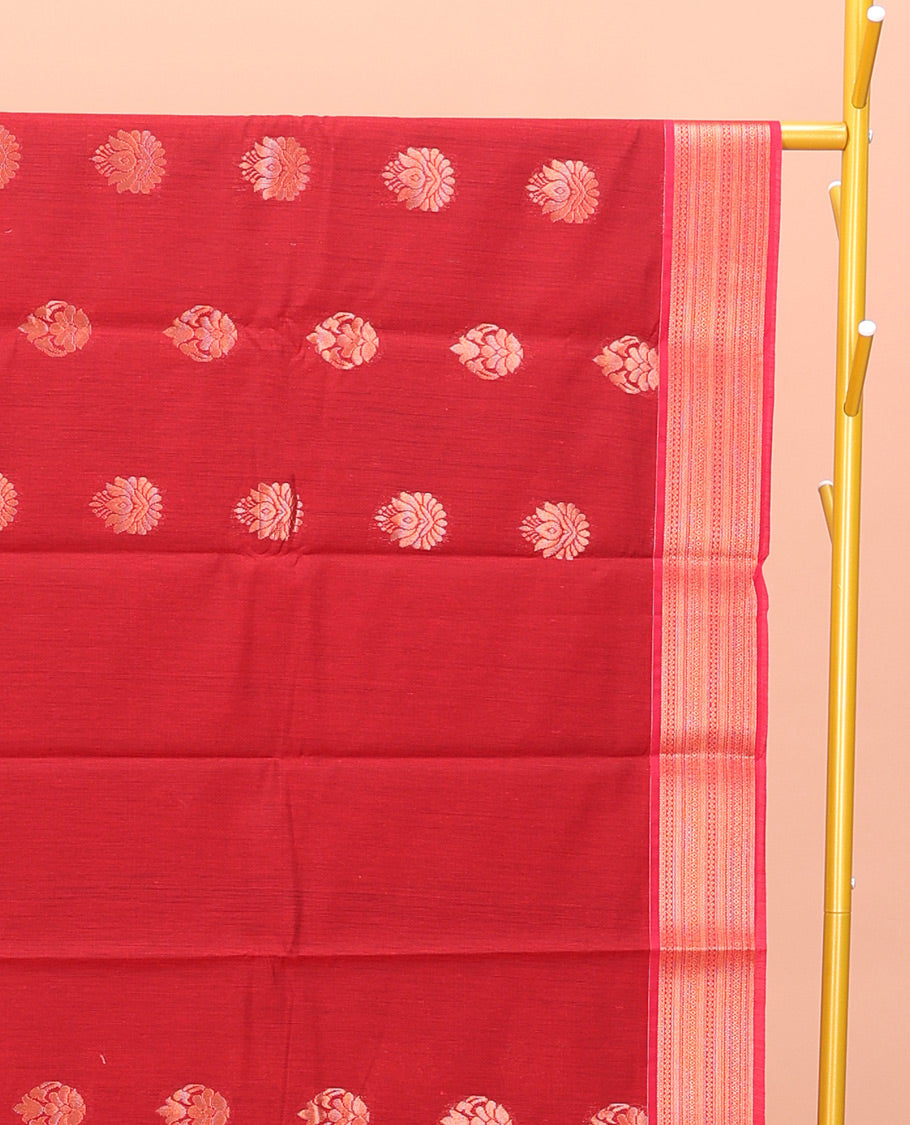 Red Semi-Silk Cotton Saree, Zari-Gleamed Up with Buttas All Over Its Body, Highlighted by a Traditional Zari Border, Pallu of Paisley Designs, and Paired with a Matching Blouse