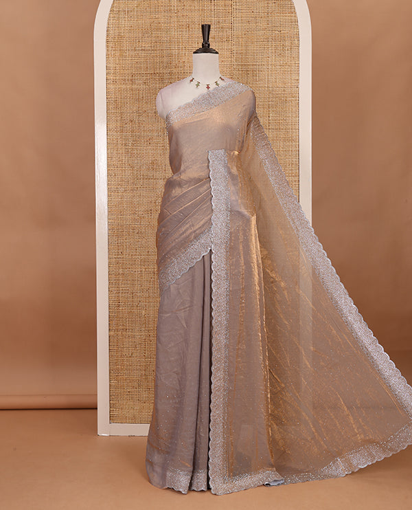 Grey Swarovski crystal stone embedded fendy chiffon saree, scallop Swarovski stone embroidered border, and contrast plain blouse