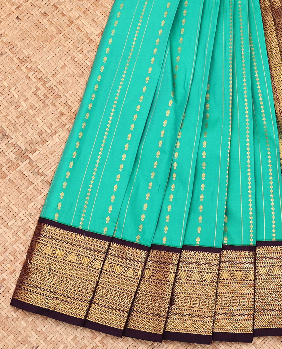 Green Budget Silk Saree, Detailed with Zari Buttas and Stripes All Over Its Body, Complemented by a Contrast Traditional Zari Design Border, Grand Jaal Pallu, and Paired with a Contrast Blouse