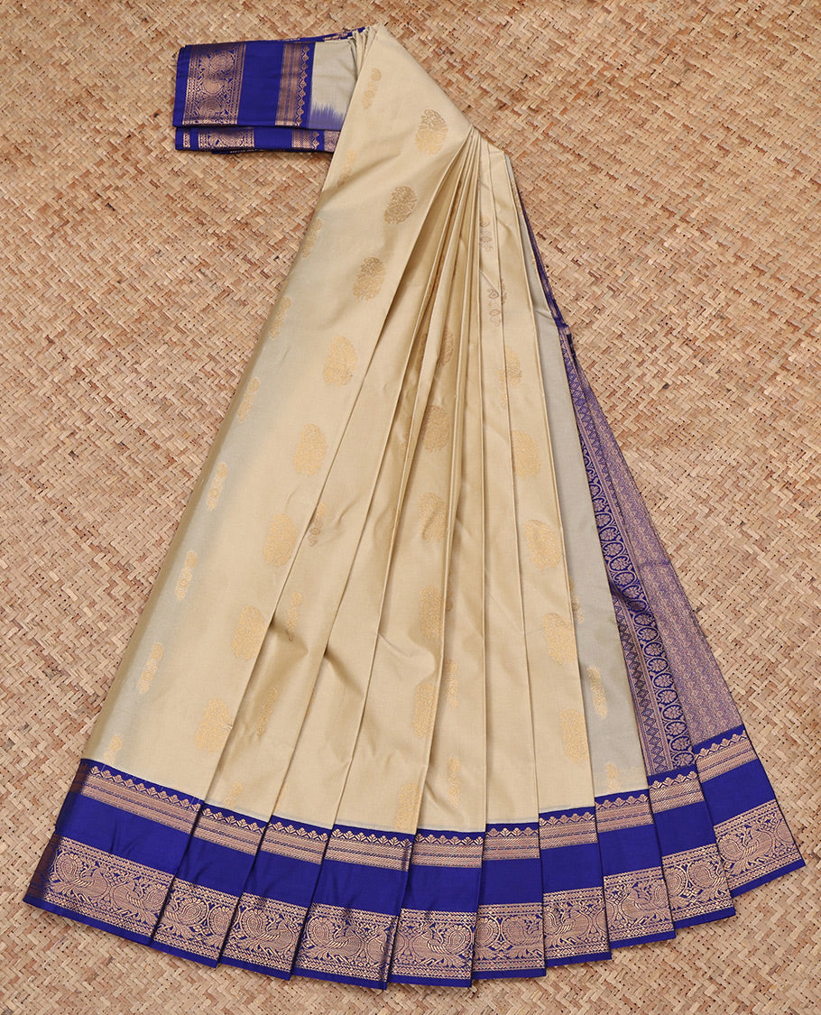 Beige Budget Silk Saree, Subtly Sparkled with Zari Buttas All Over Its Body, Complemented by a Contrast Traditional Zari Design Rettai Pettu Border, Grand Pallu, and Paired with a Contrast Blouse