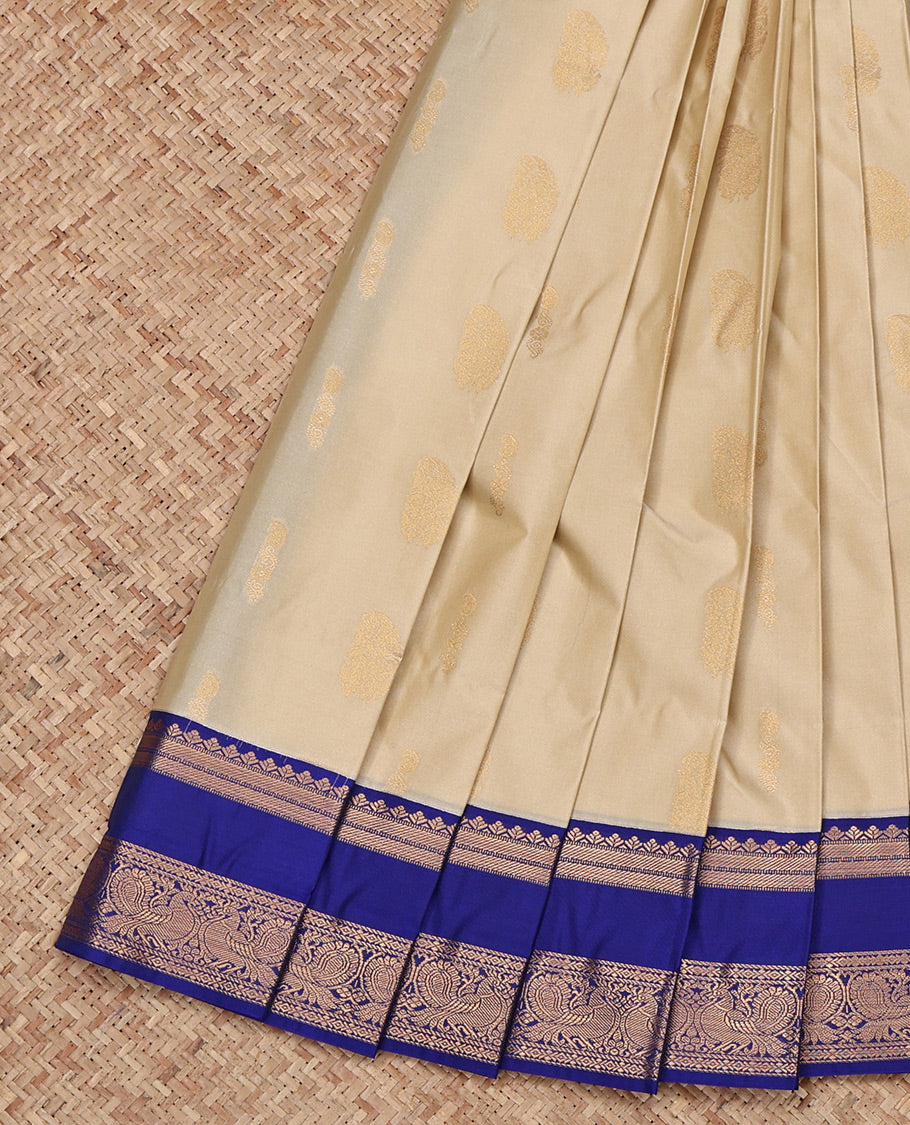 Beige Budget Silk Saree, Subtly Sparkled with Zari Buttas All Over Its Body, Complemented by a Contrast Traditional Zari Design Rettai Pettu Border, Grand Pallu, and Paired with a Contrast Blouse