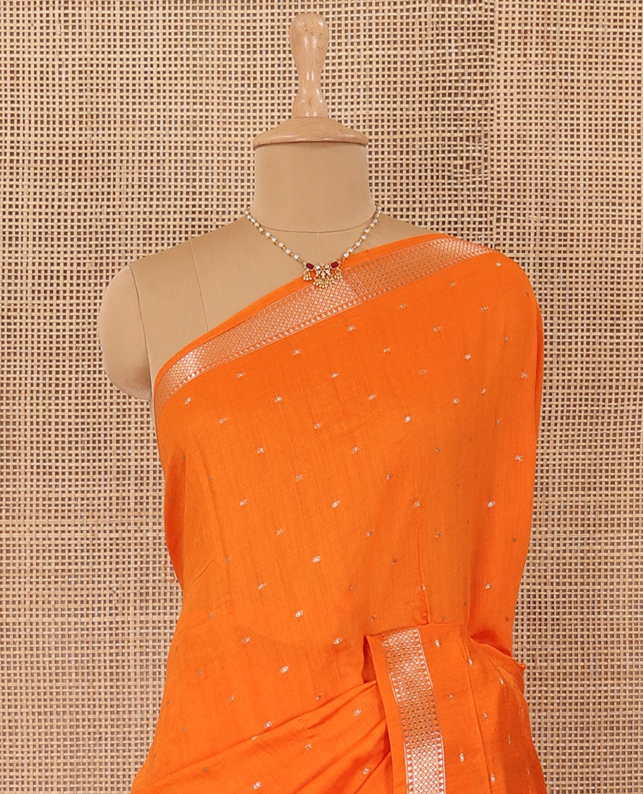Orange buttas Assam cotton saree, traditional zari border, and zari striped pallu