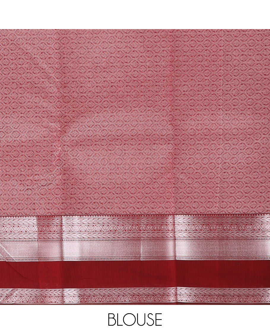 Light red semisilk cotton saree with geometric buttas, rettai pettu traditional zari border, and ogee patterned pallu