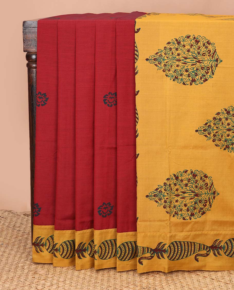 Maroon floral motifs printed poly cotton saree, contrast paisley block printed border, and block printed pallu