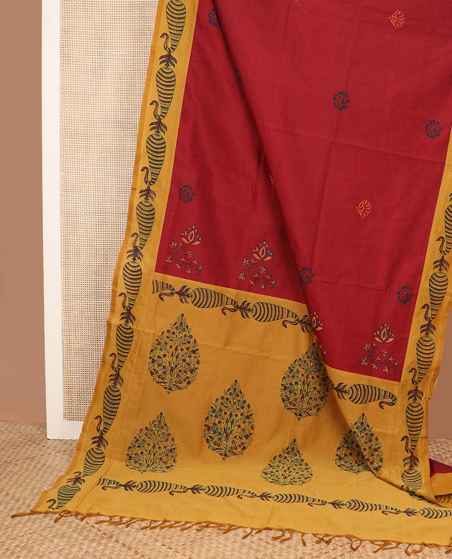 Maroon floral motifs printed poly cotton saree, contrast paisley block printed border, and block printed pallu