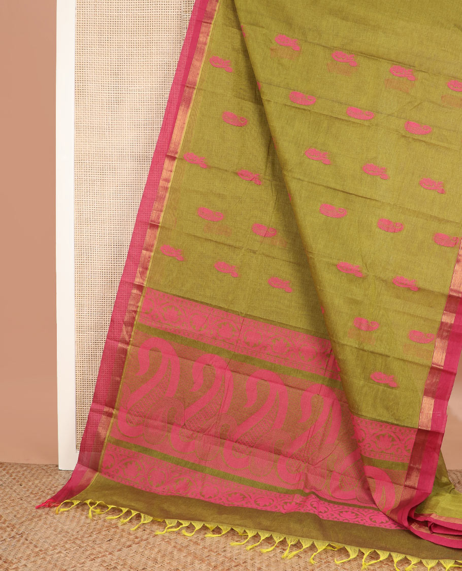 Green buttas kanchi cotton saree, contrast border, and pallu of floral creeper, and paisley designs