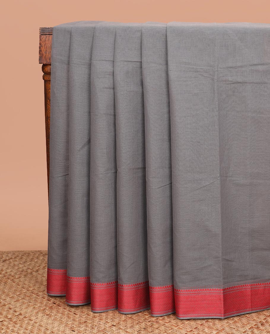 Grey sparesly striped Mangalgiri cotton saree, traditional border, striped pallu, and contrast floral printed blouse