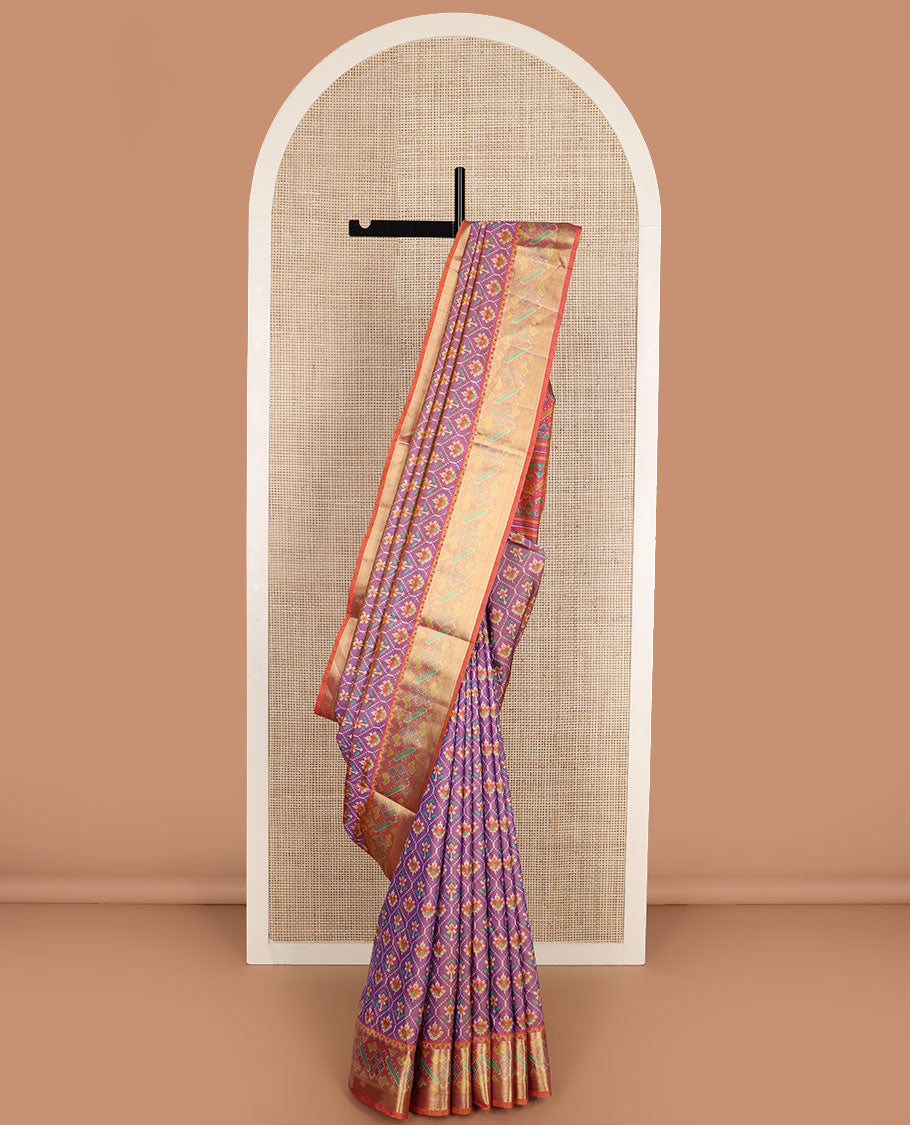 Purple floral motif enclosed jaal semi-banaras patola silk saree, contrast temple border, and pallu of floral motifs design