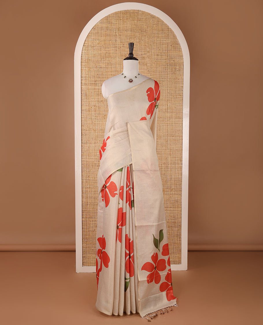Borderless cream printed onam tissue silk saree features rust color five-petal flower & leaf motifs print, matching floral print blouse