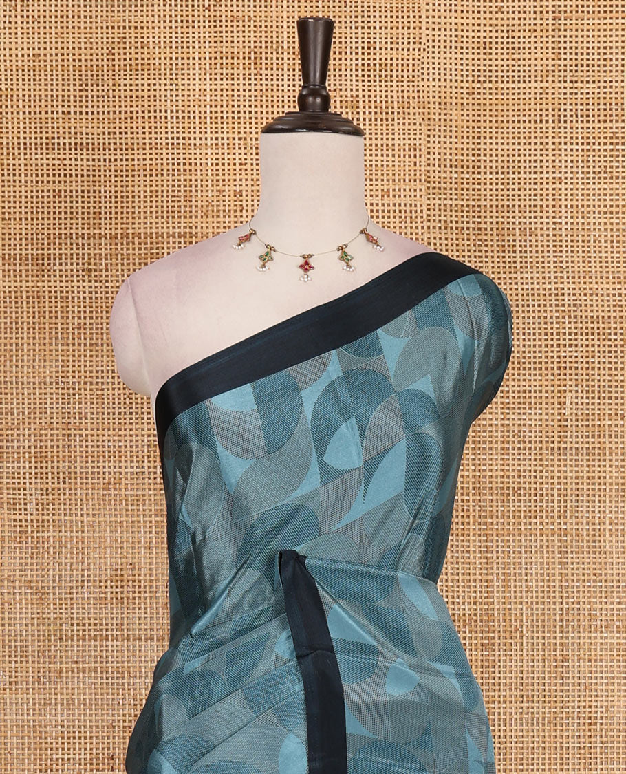Blue geometric patterns printed Turkey crepe saree, contrast printed piping border, printed pallu, and printed blouse
