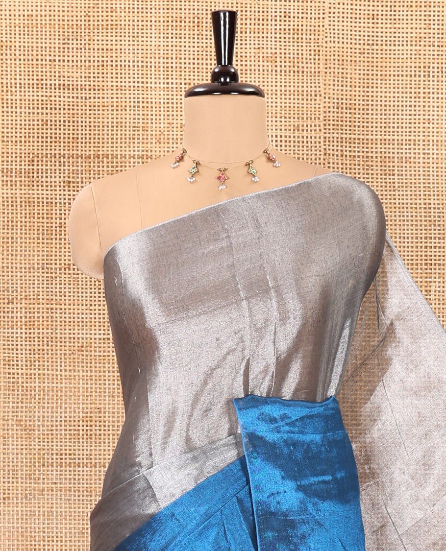 Silver and blue half-and-half plain khadi tissue saree with a self-pallu and a matching blouse