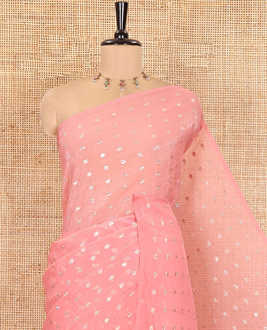 Borderless Peach Shimmer Saree, Beautified with Zari Buttas All Over Its Body, Pallu Mirrors the Same Buttas, and Comes Without a Blouse