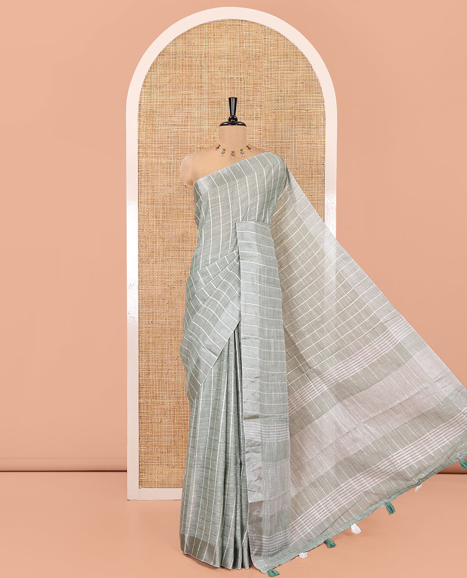 Green Jute Linen Cotton Saree, Adorned with Checked Design on Its Body, a Subtle Self-Border, Striped Pallu, and Paired with a Matching Thread Embroidered Blouse