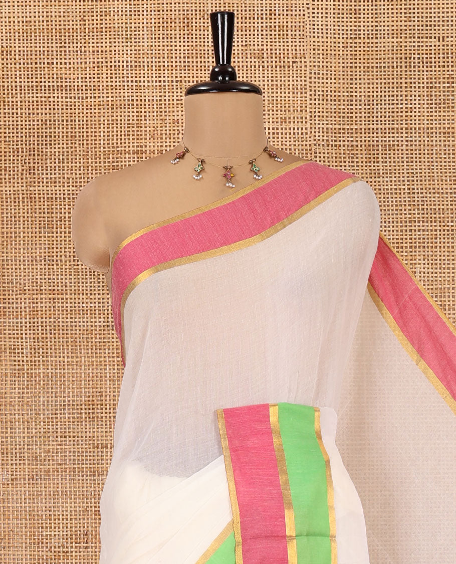 Cream Plain Khadi Mul Cotton Saree, Complemented by Contrast Pink and Green Border, a Self-Pallu, and Has No Blouse