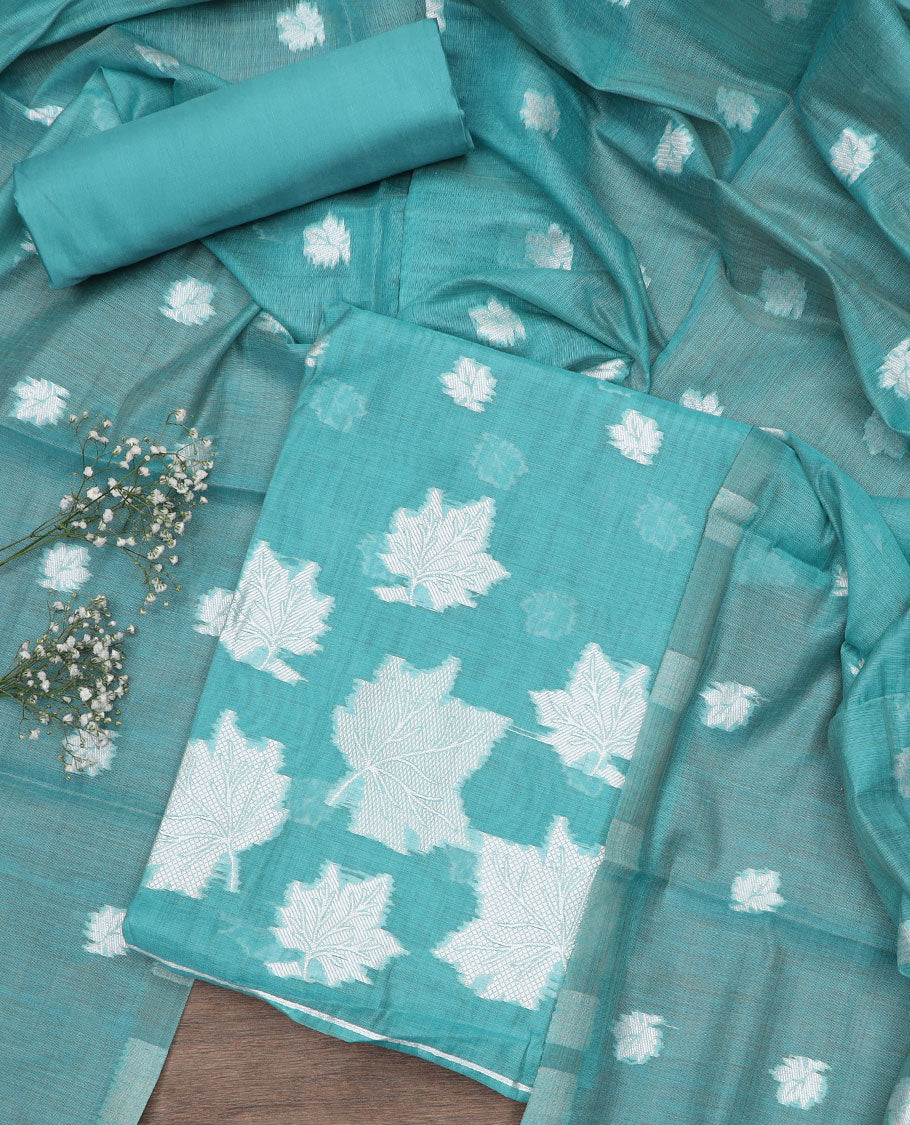 Blue material churidar set, leaf motifs top, plain bottom, and a dupatta steeped with leaf motifs