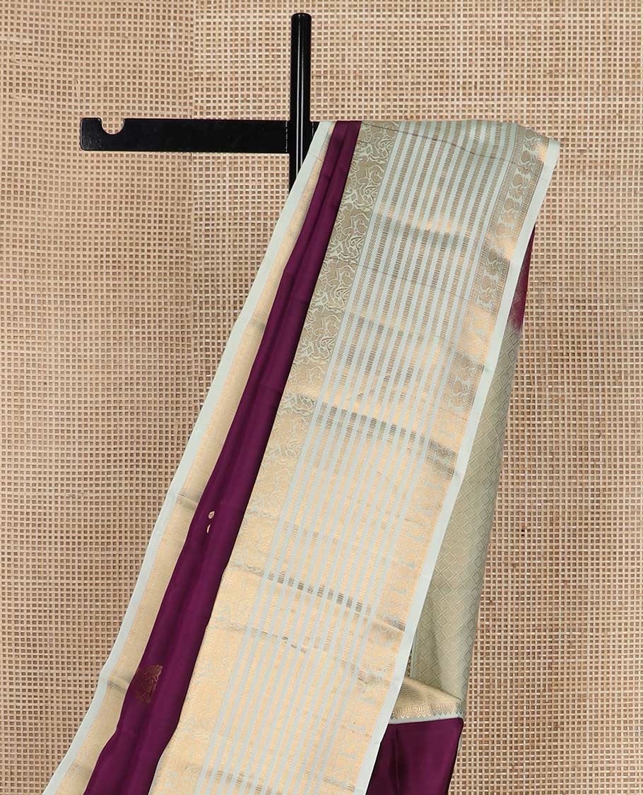 Purple zari buttas Vasundhara silk mix saree, contrast border of yaali, kathir, cross kamalam, and mayil designs, and jaal pallu