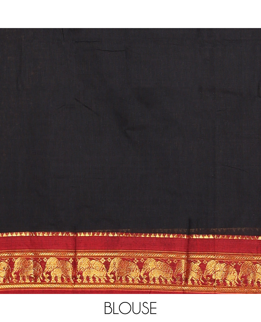 Black cotton half-saree, plain with contrast elephant motif bordered skirt, matching blouse, and contrast elephant motif bordered dhavani