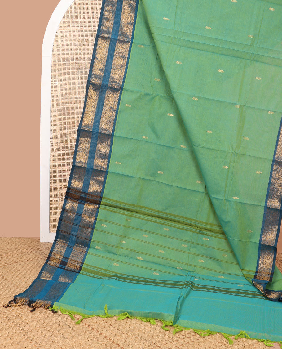 Green motifs chettinad cotton saree with contrast peacock design border & striped, floral design pallu
