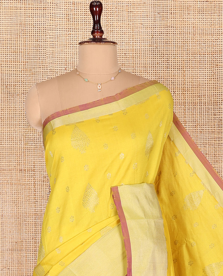 Yellow Kuppadam Cotton Saree, Sparsely Woven with Zari Buttas All Over Its Body, Complemented by a Bavanji Border, Captivating Contrast Pallu of Intricate Designs, and Paired with a Contrast Blouse