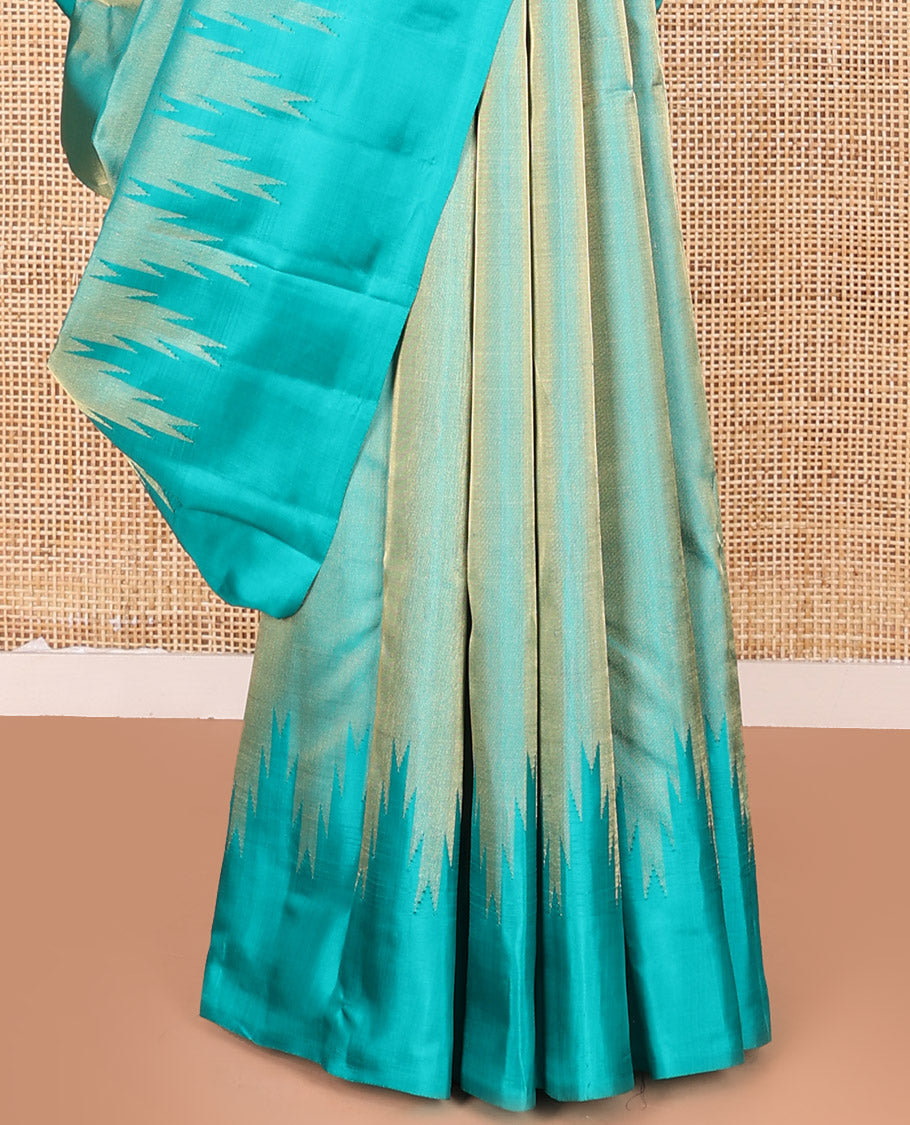 Blue Vasundhara Silk Saree Gleamed Up with Thazampoo Rekku Border, Pallu of Manga, Kodi Visiry, and Thazampoo Rekku Designs, and Paired with a Matching Blouse
