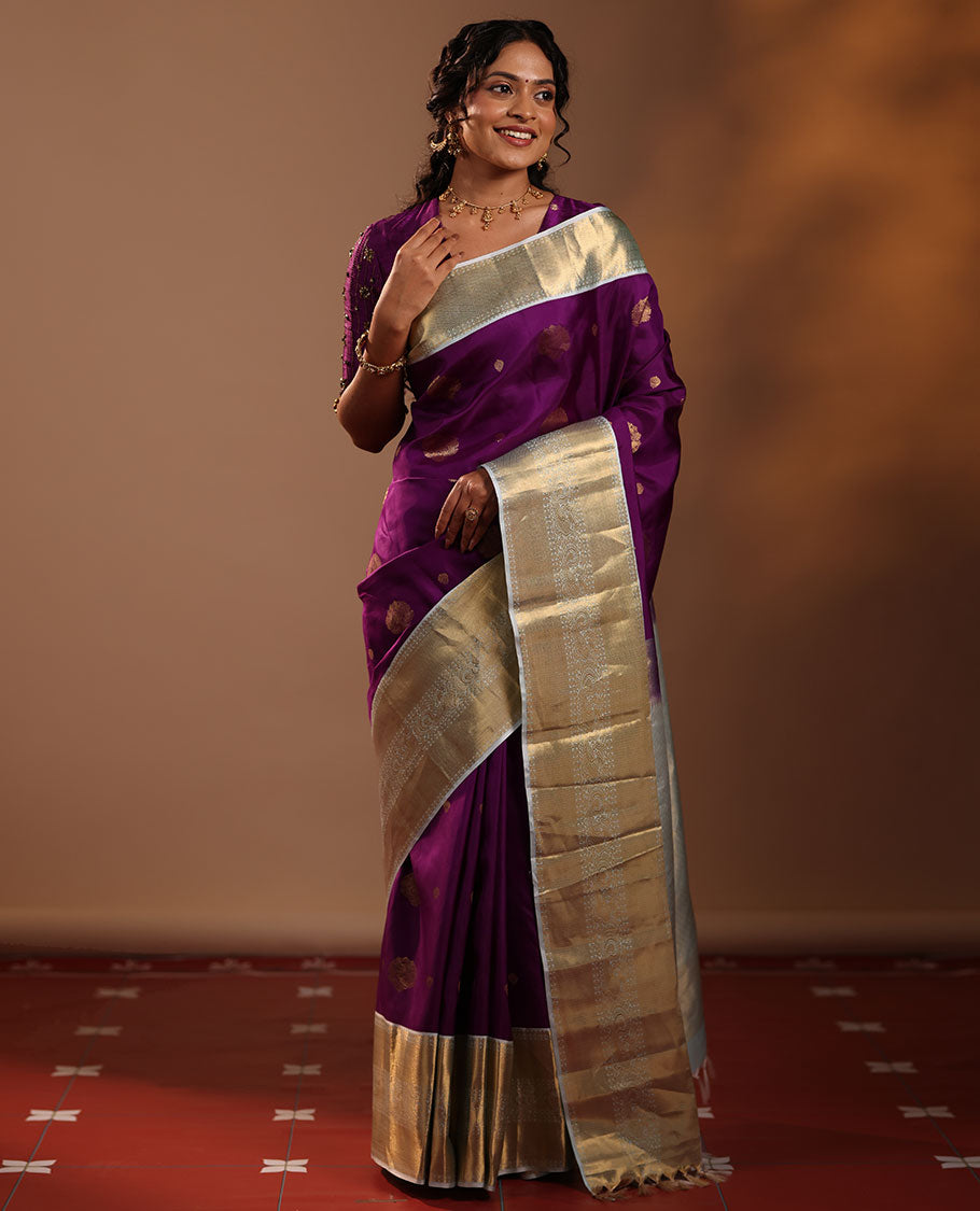 Purple Vasundhara Silk Saree Adorned with Zari Buttas, Enthralled with a Contrast Border of Mayil Kann, Mayil, and Rudraksham Designs, Complemented by a Pallu of Intricate Zari Designs, and Paired with a Contrast Blouse