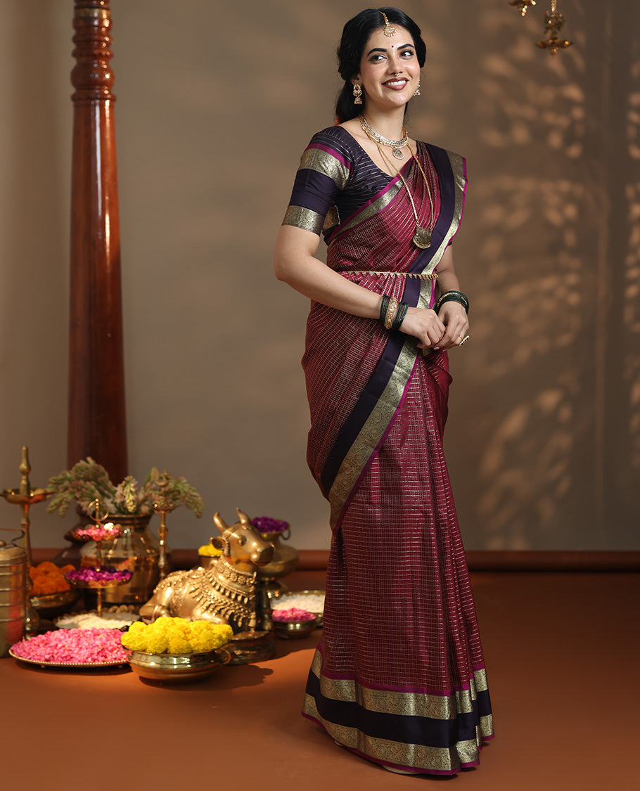 Maroon vaira oosi checked Vasundhara silk saree, contrast rettai pettu border of kodi mayil designs, jaal pallu, and zari design blouse