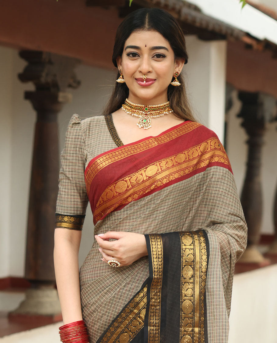 Beige plain chettinad cotton saree, contrast traditional zari rettai pettu ganga jamuna border, striped pallu, and a matching blouse