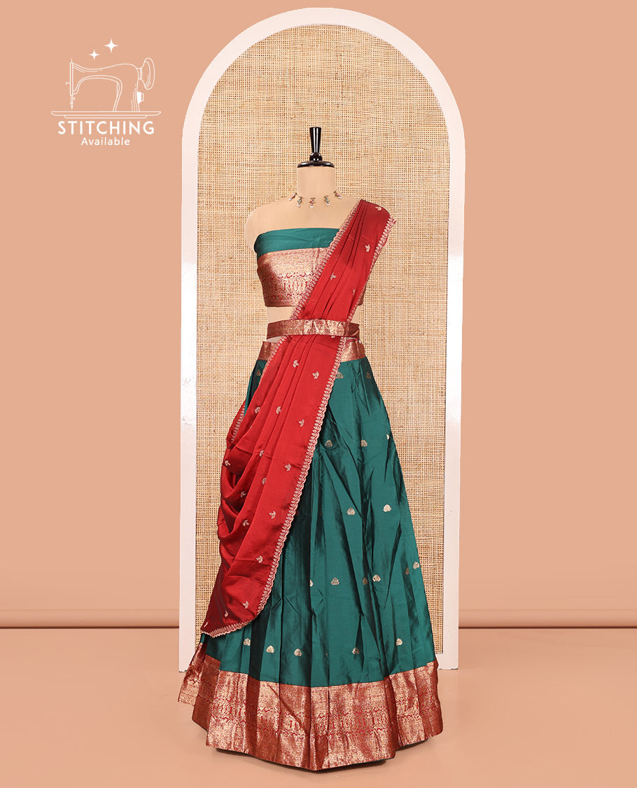 Dark Green and Red Semi-Banarasi Half-Saree, Adorned with Zari Buttas on Its Skirt, Complemented by a Contrast Traditional Zari Design Woven Border, Paired with a Matching Blouse, and a Contrast Satin Georgette Embroidered Scallop Dhavani