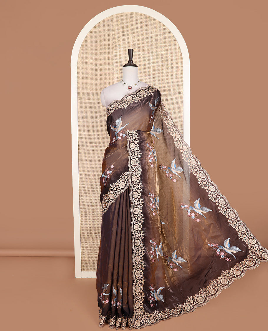 Brown crane and floral motifs thread embroidered designer saree, scallop floral thread embroidered border, and embroidered pallu