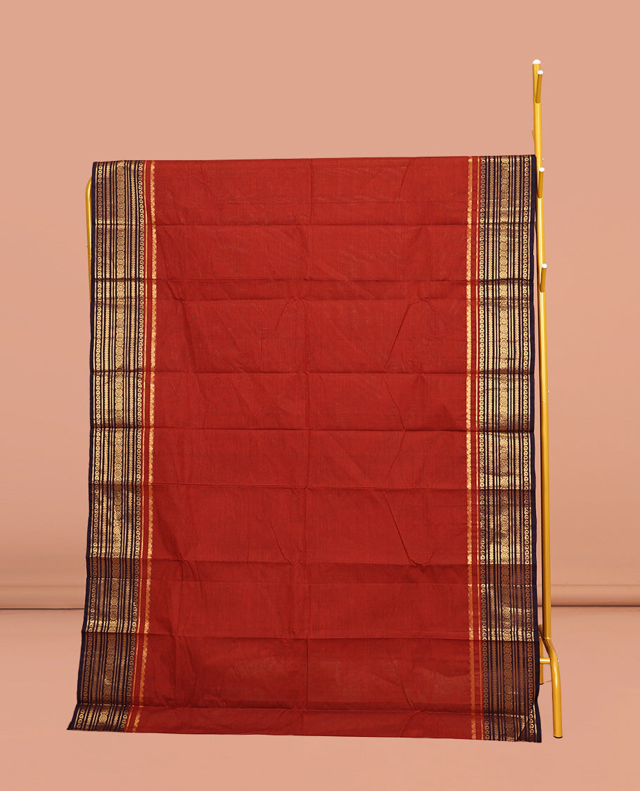 Rust Plain Chettinad Cotton Saree, Complemented by a Contrasting Traditional Zari Design Border, Subtly Striped Pallu, and Paired with a Matching Blouse