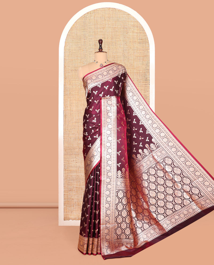 Maroon Banarasi Nylon Saree, Gleamed Up with Buttas, a Floral Creeper Zari Border, Intricate Pallu, and a Matching Blouse