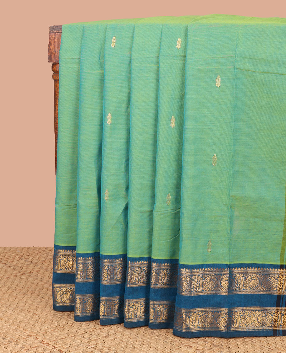 Green motifs chettinad cotton saree with contrast peacock design border & striped, floral design pallu