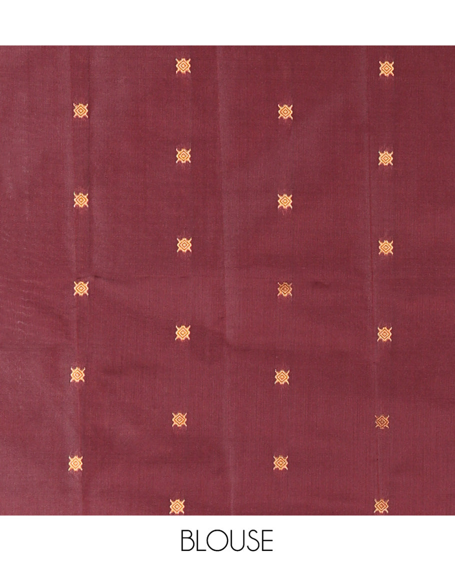 Rust Orange Kanchi Soft Silk Saree, Enriched with Vaira Oosi Stripes, and Zari Buttas All Over Its Body, Complemented by a Contrast Zari Design Border, an Intricately Designed Pallu, and Paired with a Contrast Blouse