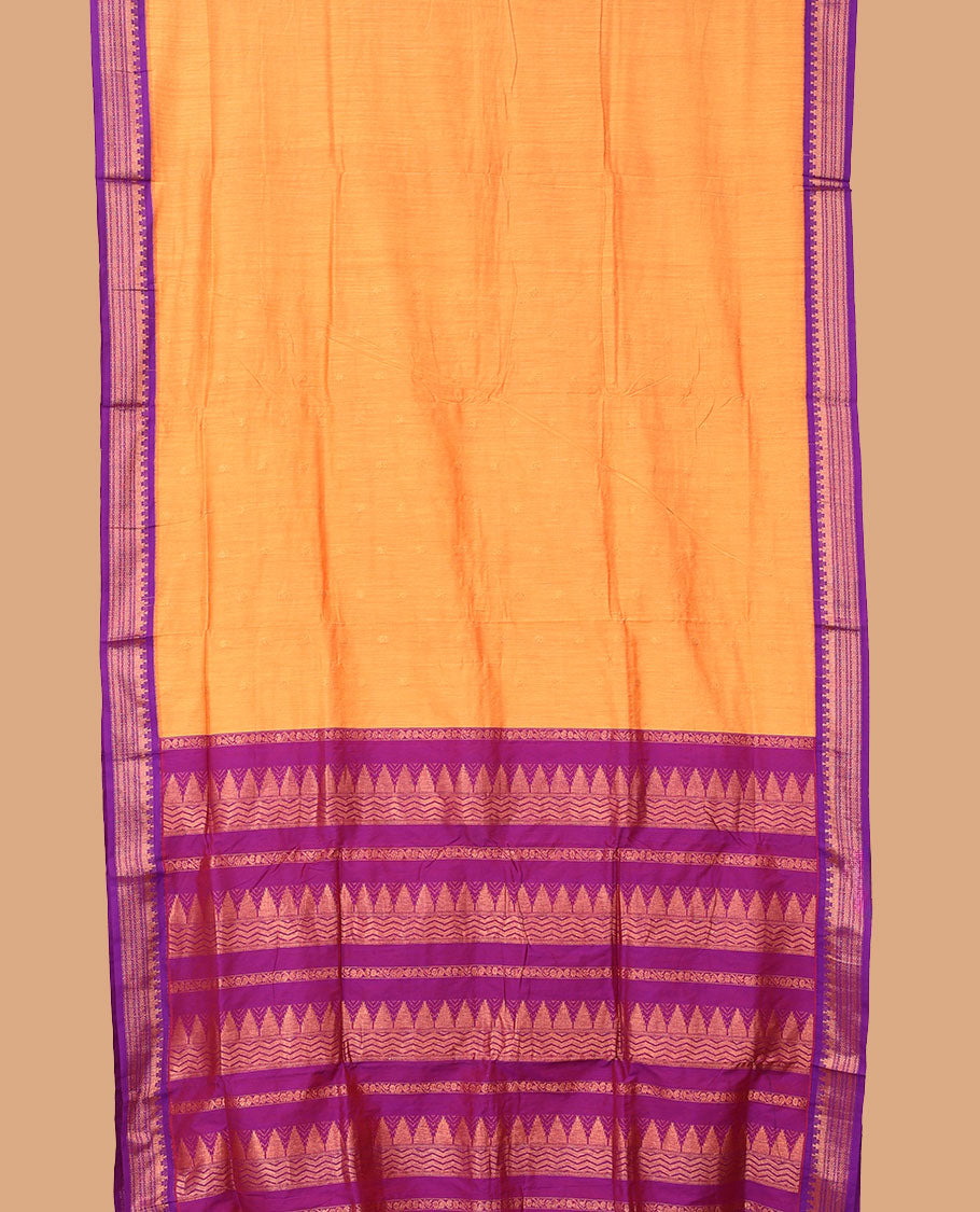 Orange buttas nine-yard cotton saree, contrast traditional zari border, and pallu steeped with traditional designs