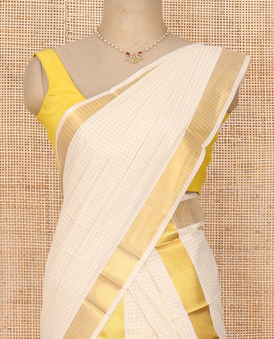 Cream base gold zari micro-checked Kerala mundu set, zari bavanji border