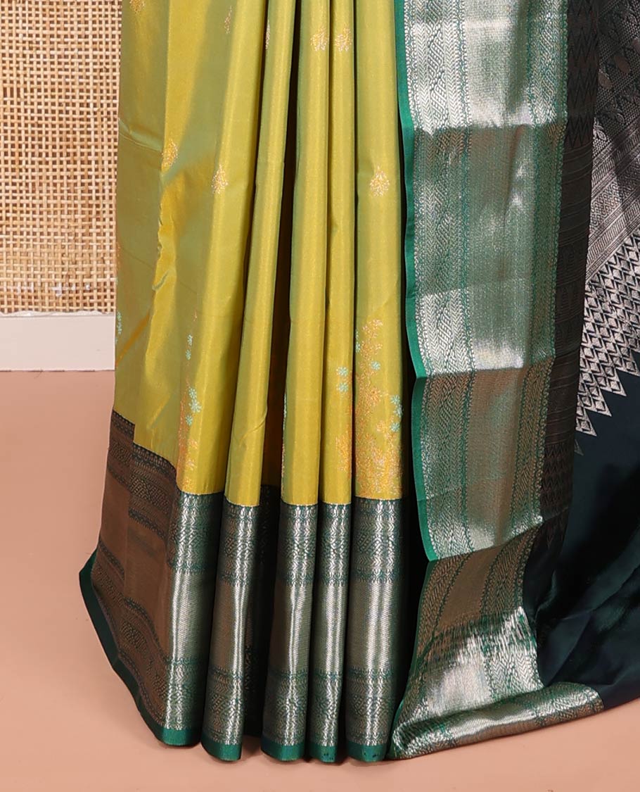 Green Budget Silk Saree, Gracefully Embellished with Zari Buttas All Over Its Body, Complemented by a Contrast Traditional Zari Design Border, Chevron Striped Pallu, and Paired with a Contrast Blouse