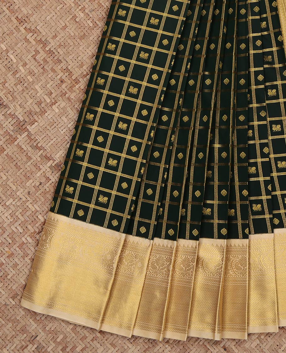 Green Budget Silk Saree, Gleamed Up with Zari Butta Enclosed Checks on Its Body, Complemented by a Contrast Traditional Zari Border, Grand Jaal Pallu, and Paired with a Contrast Blouse
