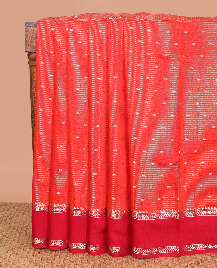 Red buttas and striped assam silk saree, contrast traditional zari border, and pallu of zari stripes