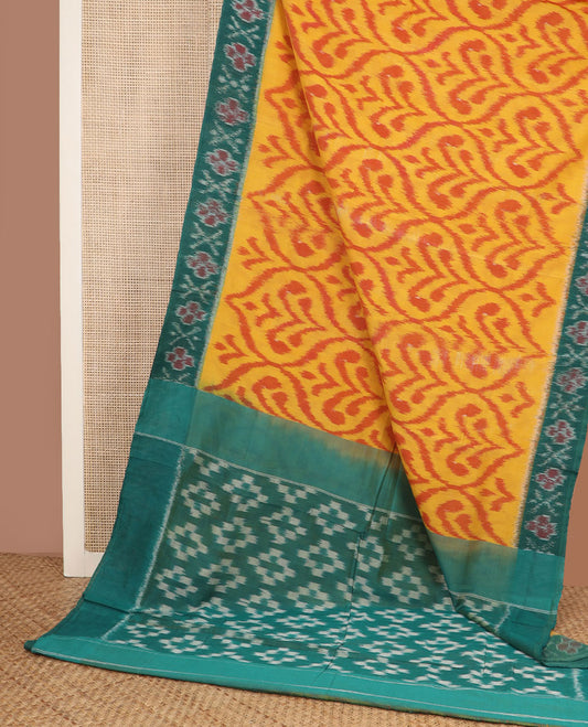 Yellow ogee-patterned ikkat cotton saree, contrast cross & floral motifs ikat border & ikkat design pallu