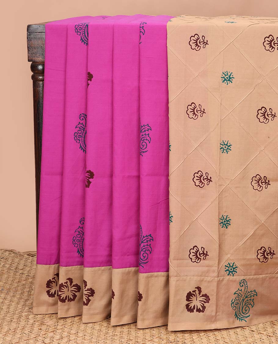 Rani pink motifs printed poly cotton saree, contrast floral-theme block printed border, and butta enclosed jaal pallu