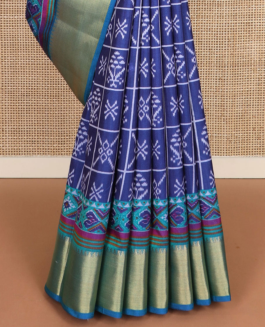 Navy blue butta enclosed checked semi-banaras patola silk saree, contrast temple zari border of ikkat design, and pallu steeped with geometric patterns